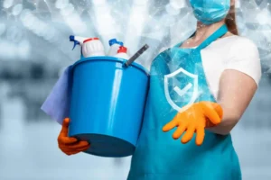 Worker with premium cleaning products 
